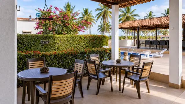 Varanda mobiliada voltada para o jardim